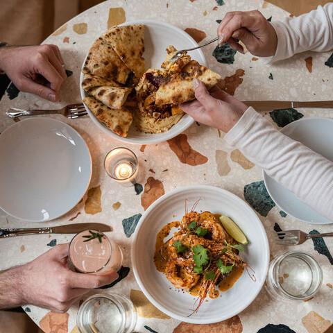 Food to the plates at West Rose Restaurant in Ellicottville