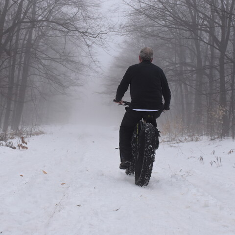 Fat biker along Allegany State Park trails