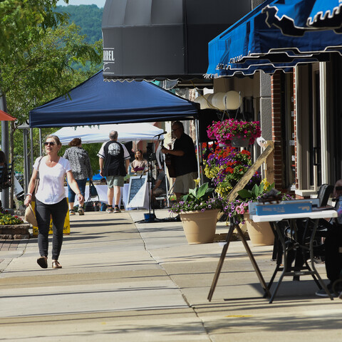 Person enjoying a stroll through walkable Olean 