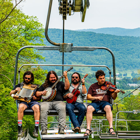 Band on a lift to the HillTap Festival